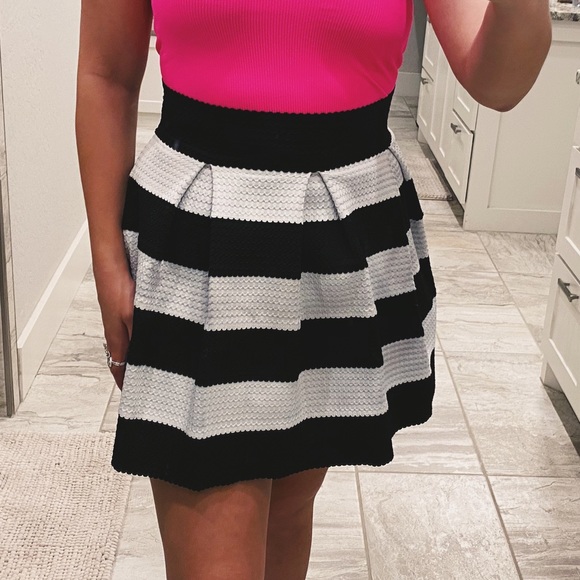Finesse Dresses & Skirts - black & white striped pleated mini skirt